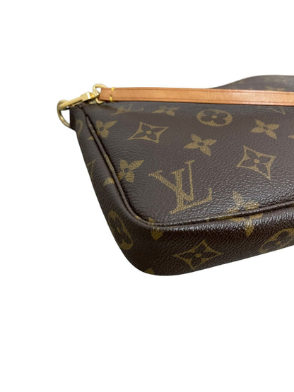 Dettaglio ravvicinato dell'angolo e della curvatura laterale in tela monogram Louis Vuitton
