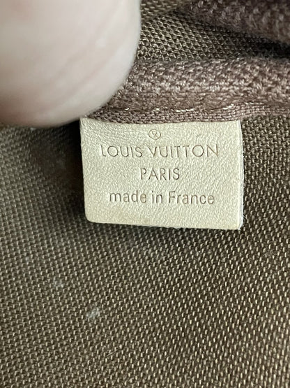 Etichetta in pelle interna Made in France della pochette piccola Louis Vuitton