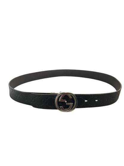 Cintura Gucci Guccissima nera fibbia GG argento distesa piatta