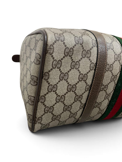 Dettaglio angolo inferiore Gucci Ophidia Boston Bag GG Supreme