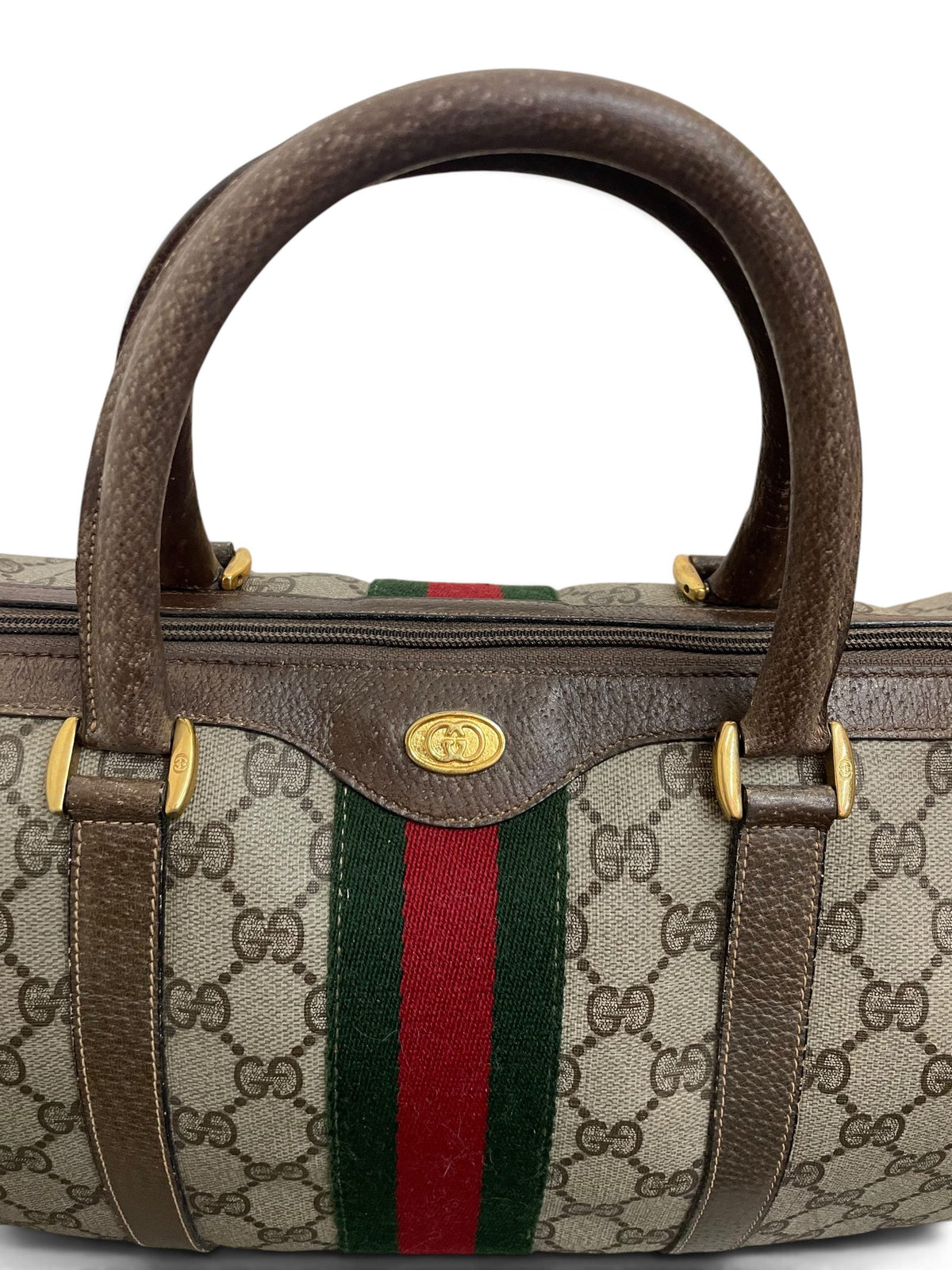 Dettaglio manici e logo GG dorato Gucci Ophidia Boston