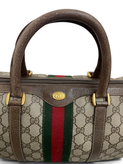 Dettaglio manici e logo GG dorato Gucci Ophidia Boston