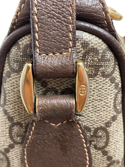 Dettaglio hardware dorato Gucci Ophidia con leggera usura