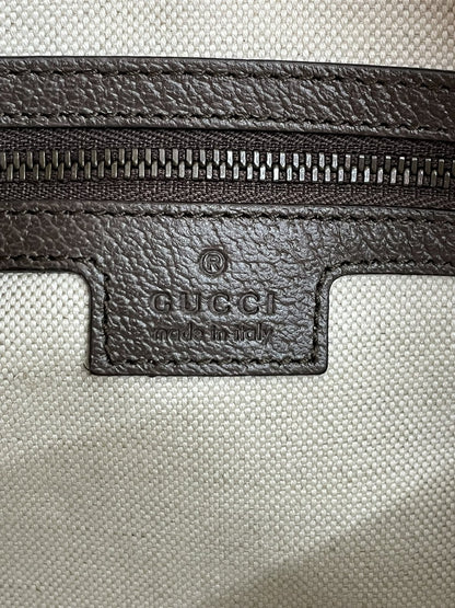 Etichetta interna in pelle marrone con marchio Gucci Made in Italy - agevintage