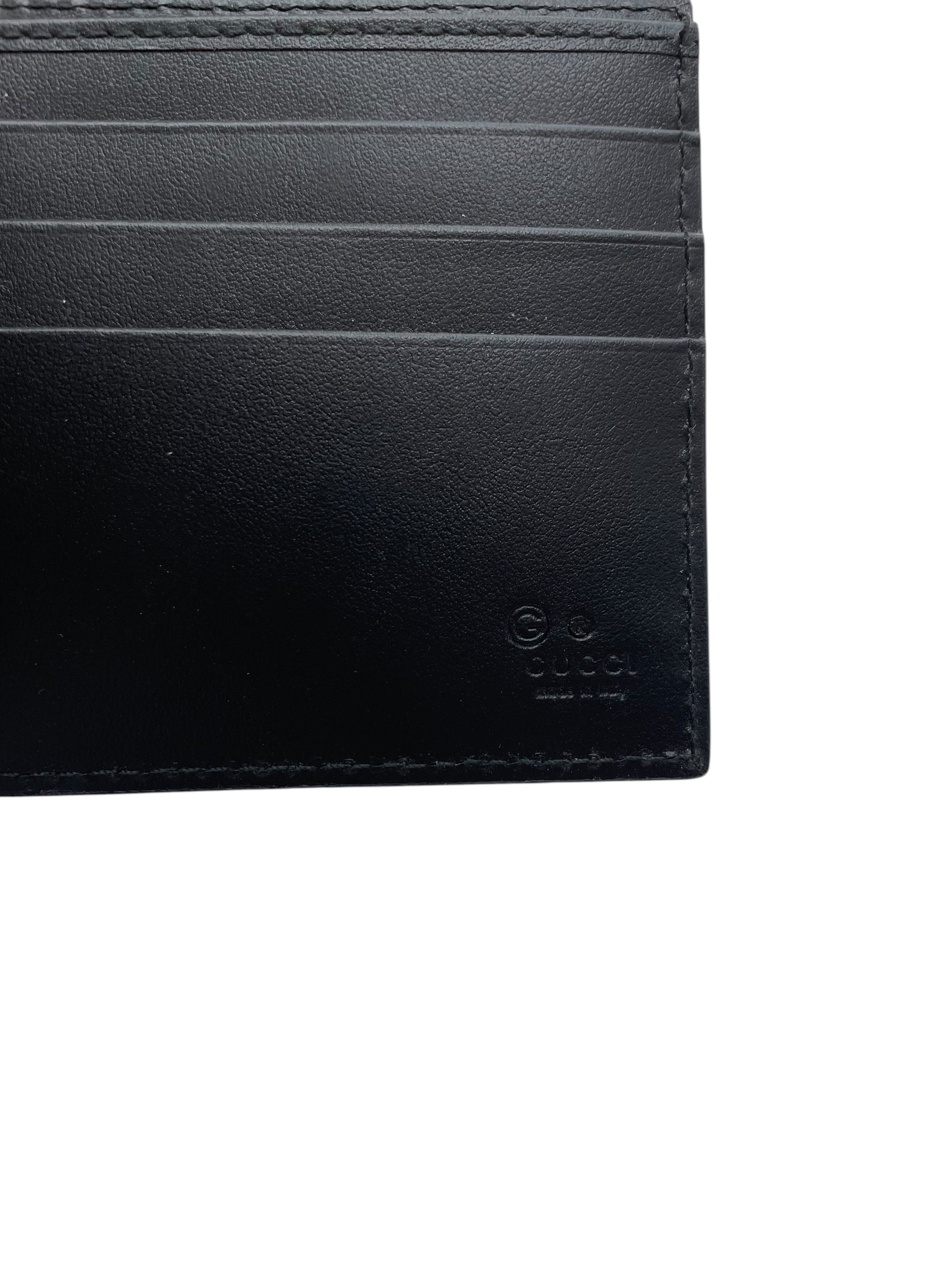 Interno portafoglio Gucci nero scomparti carte logo