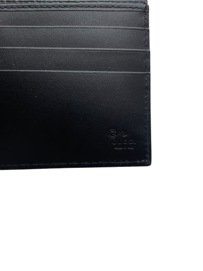 Interno portafoglio Gucci nero scomparti carte logo