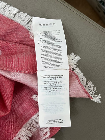 Etichetta composizione tessuto 70% lana 30% seta Gucci