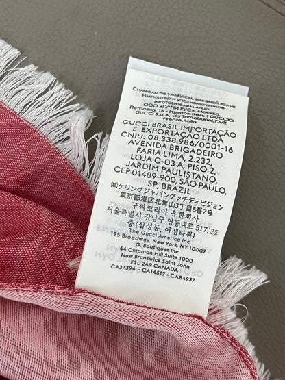Etichetta distributori internazionali sciarpa Gucci GG monogram