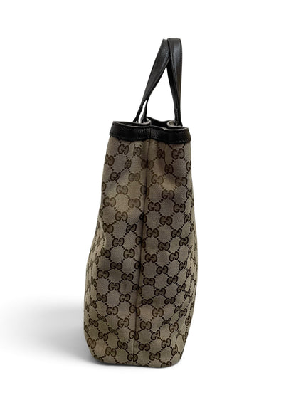 Profilo laterale borsa Gucci tote GG canvas marrone