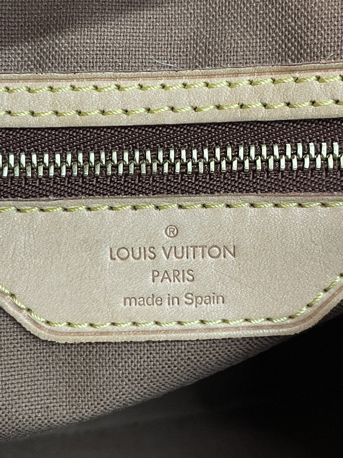 Etichetta interna in vacchetta con marchio Louis Vuitton Paris Made in Spain - agevintage