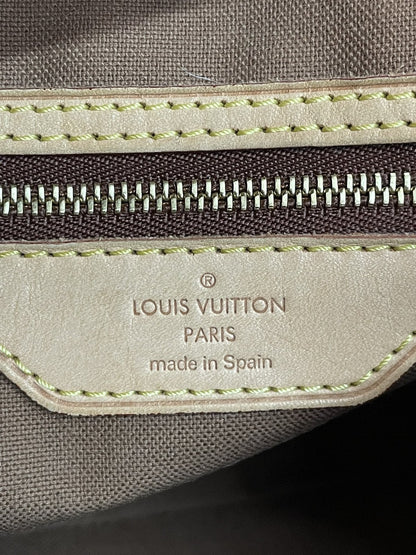 Etichetta interna in vacchetta con marchio Louis Vuitton Paris Made in Spain - agevintage