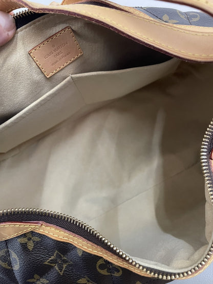 Interno in microfibra beige della borsa Louis Vuitton Étoile GM