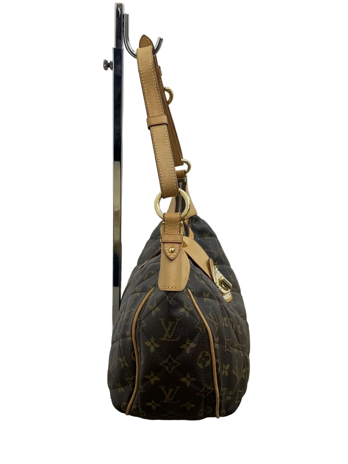 Vista laterale della borsa a spalla Louis Vuitton Étoile GM