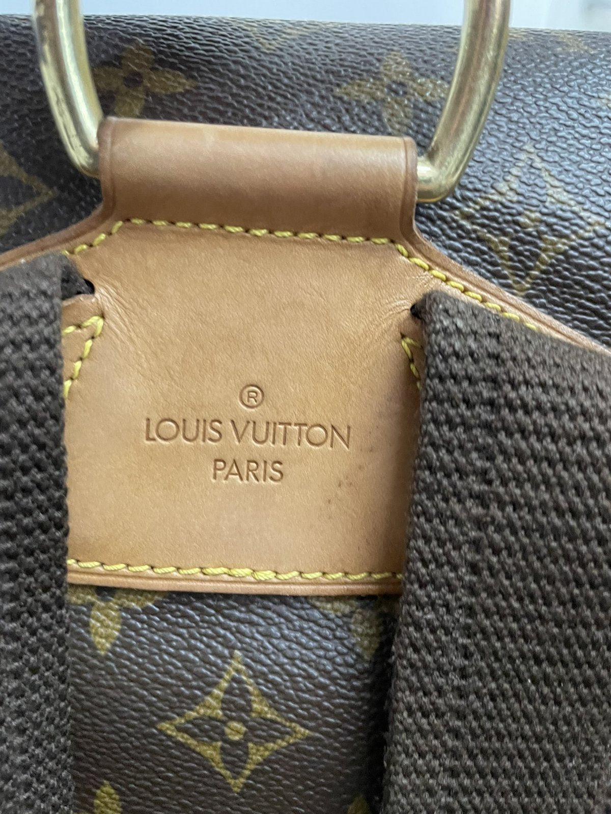 Dettaglio dell'attacco del manico e della vacchetta posteriore Louis Vuitton - agevintage