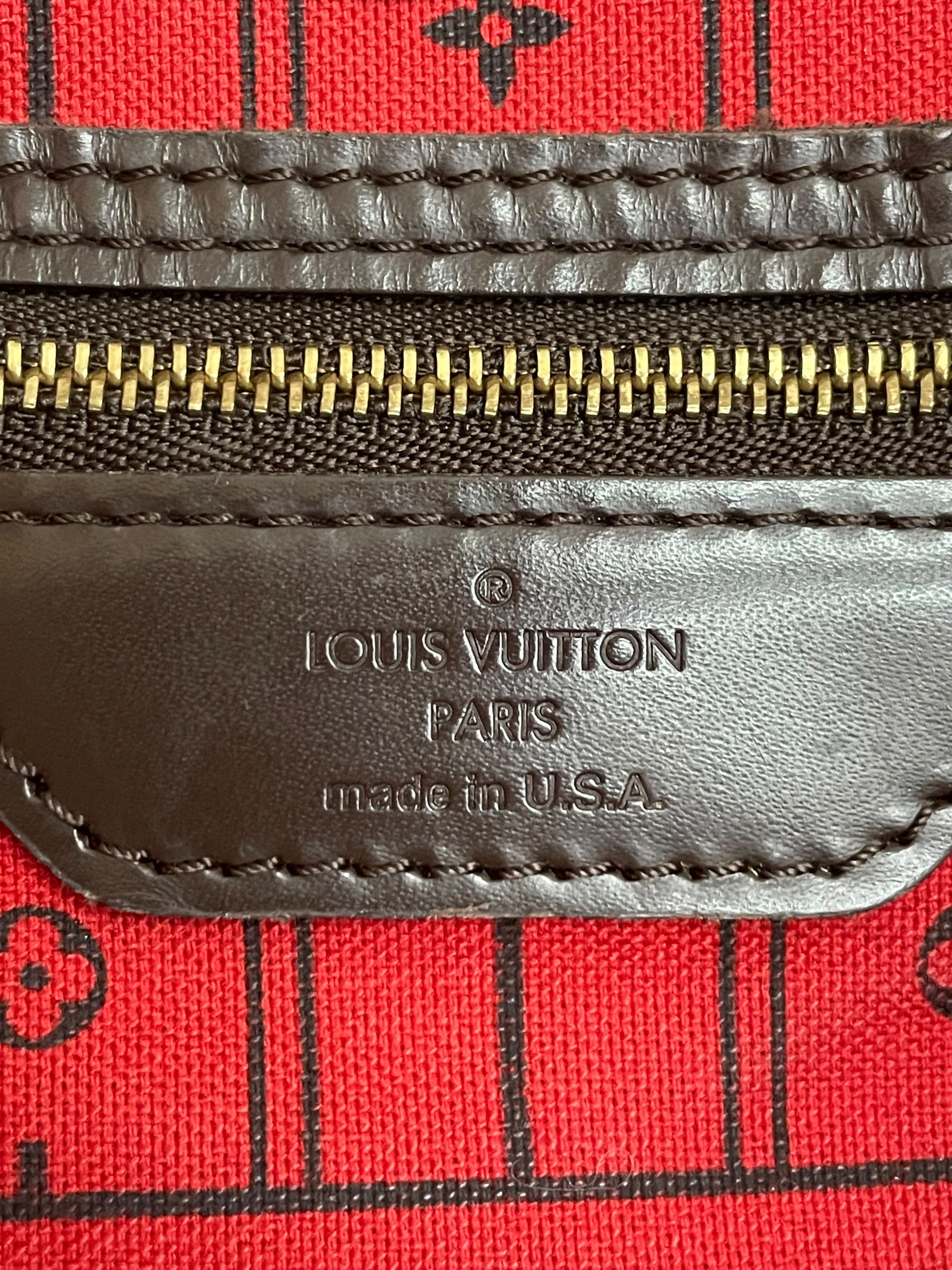 Etichetta Louis Vuitton Paris made in USA borsa Neverfull