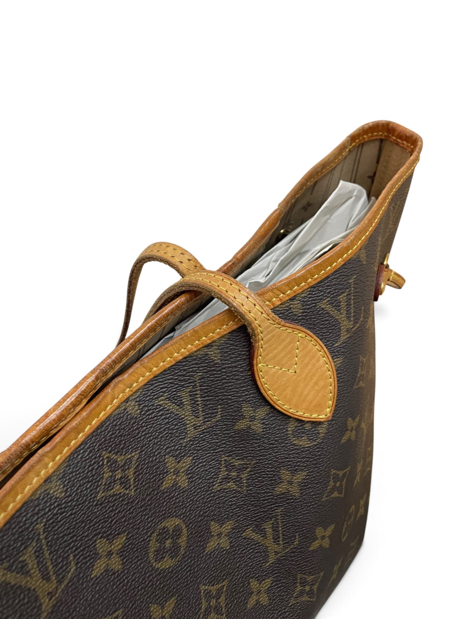 Dettaglio manico superiore Louis Vuitton Neverfull MM vachetta