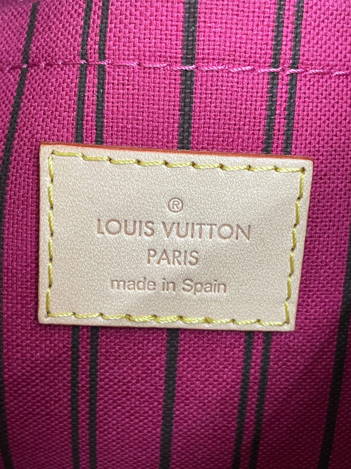 Etichetta Louis Vuitton Paris Made in Spain interno pochette