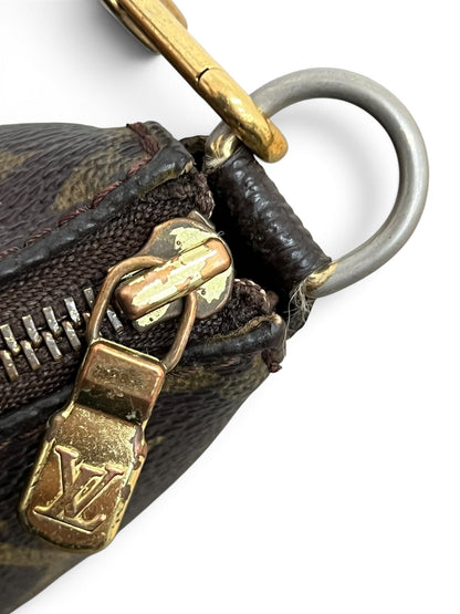 Usura zip e tirante LV pochette Louis Vuitton vintage