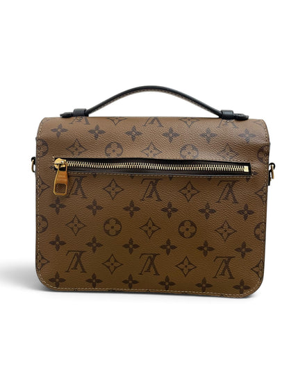 Louis Vuitton Pochette Métis retro tasca con zip dorata
