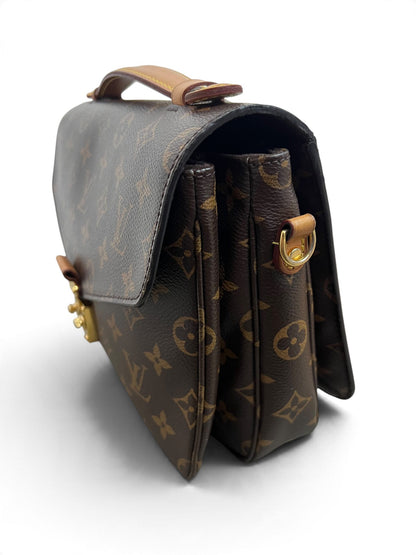 Profilo laterale sinistro Louis Vuitton Pochette Métis Monogram