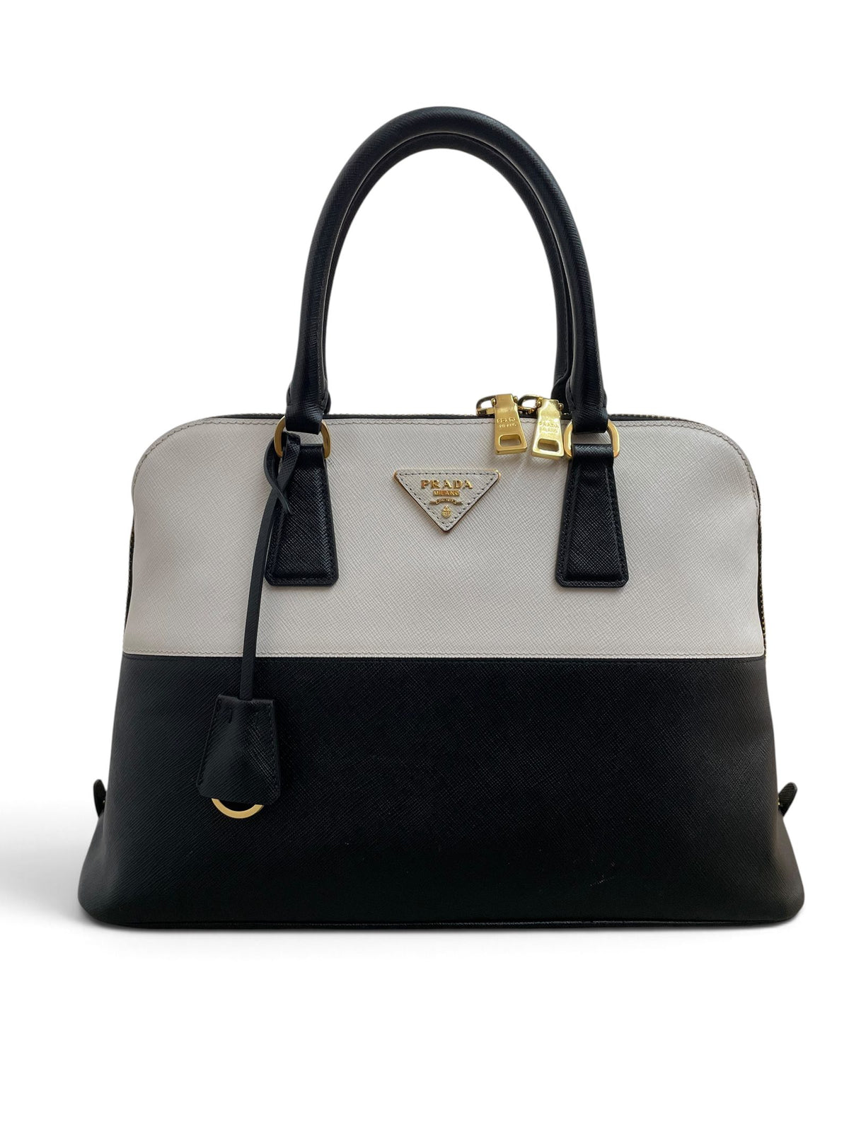 Fronte borsa Prada Promenade Saffiano bicolore bianco nero hardware dorato