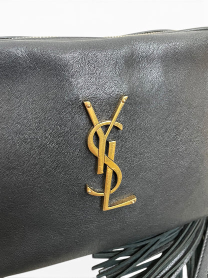 Monogramma YSL dorato su pelle nera