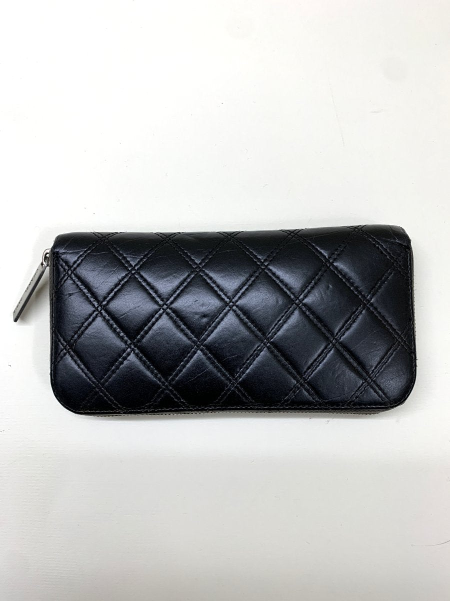 Chanel portafoglio vintage in pelle colore nero - AgeVintage