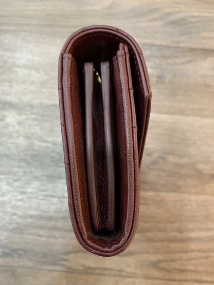 Saint Laurent Portafoglio monogramme in pelle bordeaux - AgeVintage